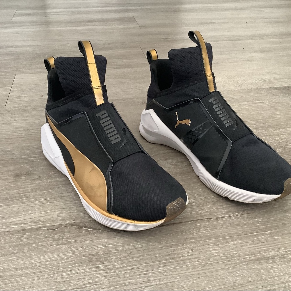 Puma Black and Gold Athletic Shoes